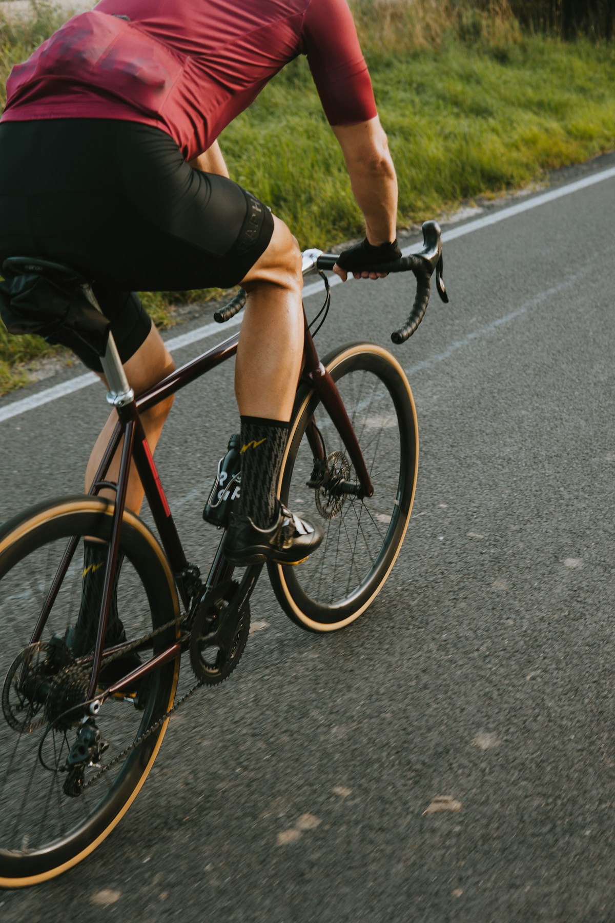 Road cyclist on a paved road